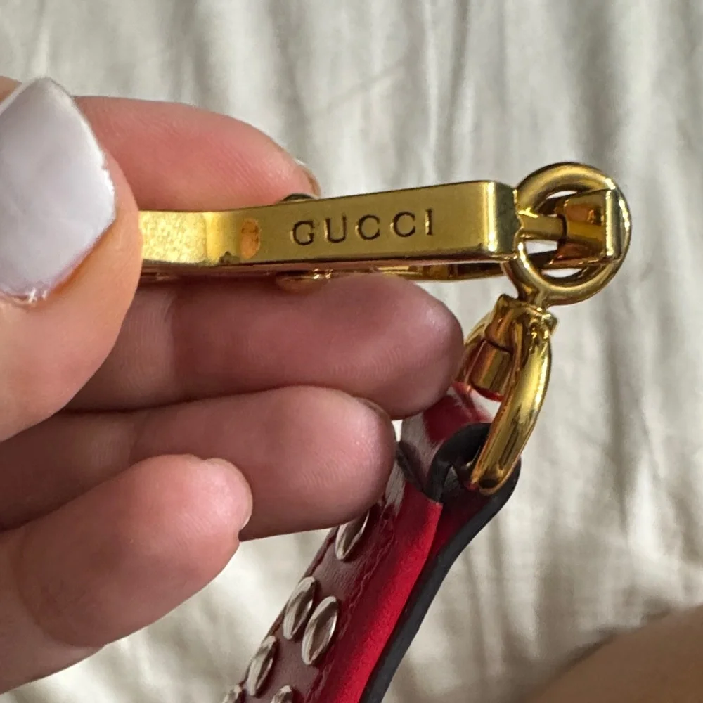 Gucci Red Leather Eyelet Strap with Gold Clasp